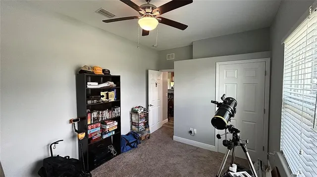 a room with furniture and a window