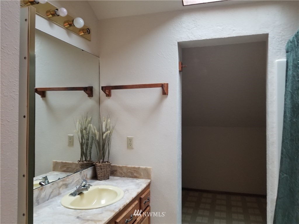 230 Wilcox Road Salkum, WA 98582 - Photo 14 of 18 a bathroom with a sink and a mirror