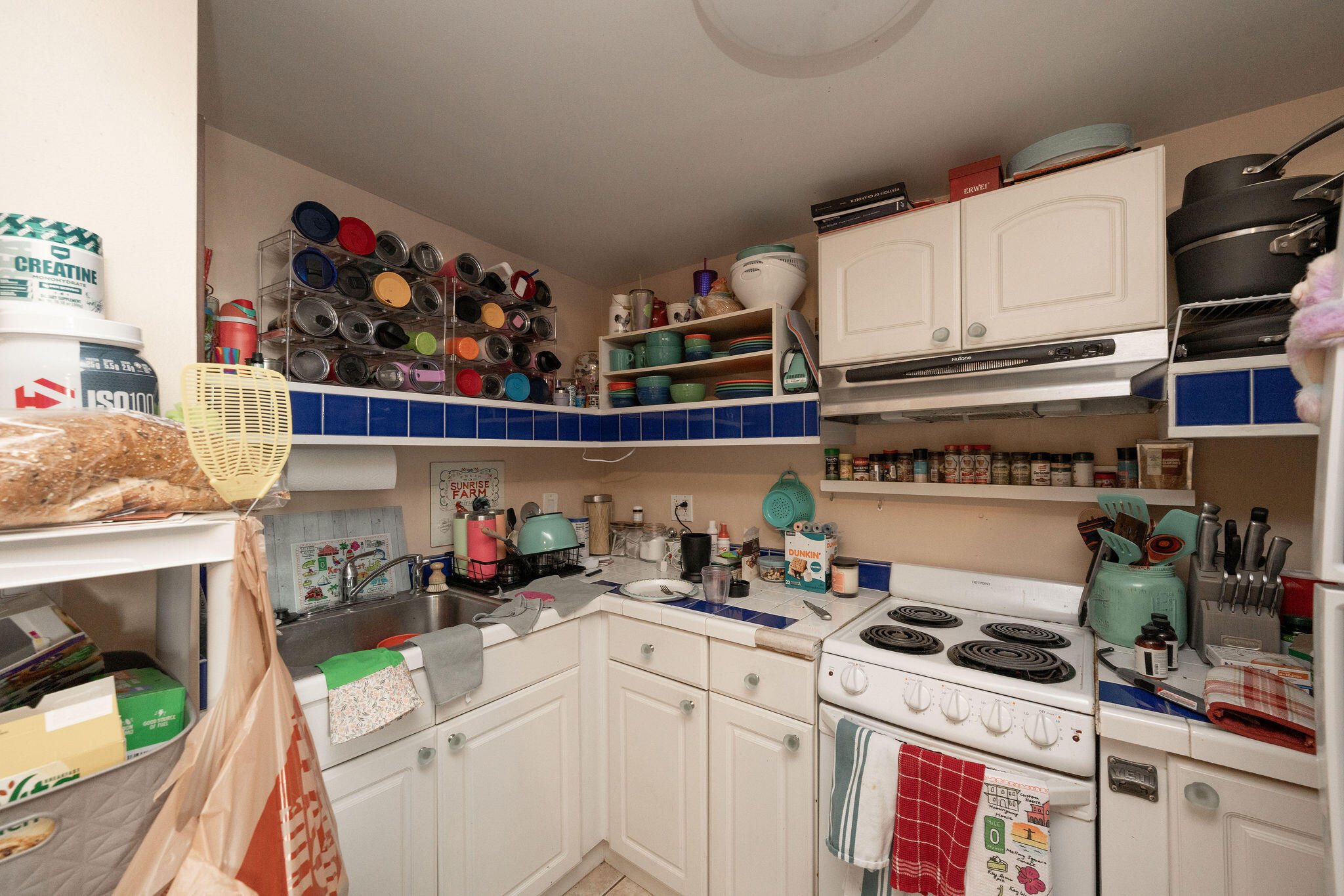 2004 Patterson Avenue Key West, FL 33040 - Photo 13 of 24 a kitchen with a stove and cabinets
