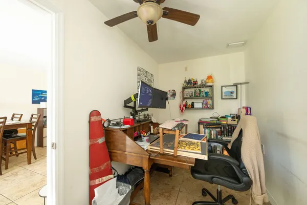 a view of a workspace with furniture