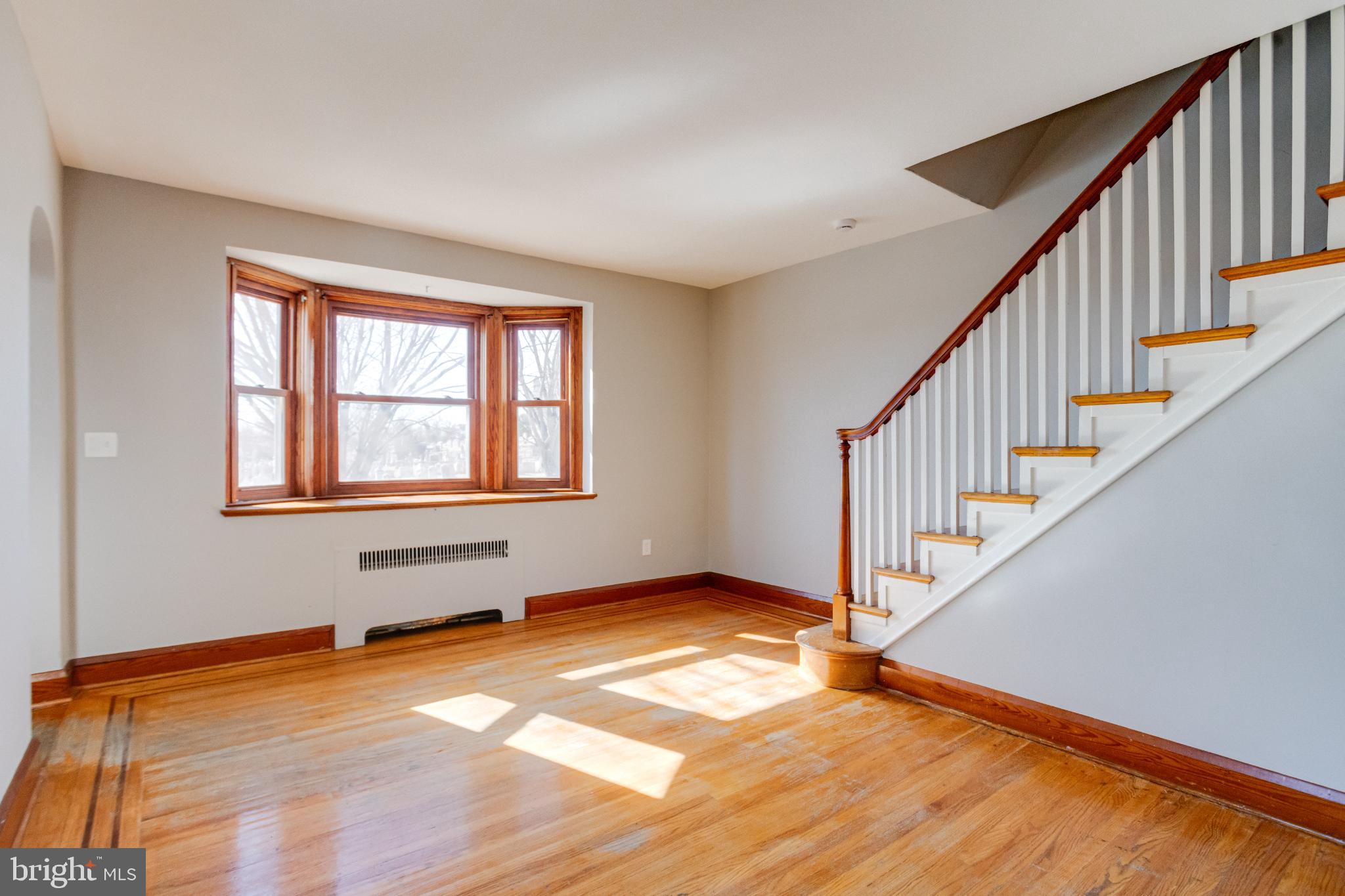 4114 Moravia Road Baltimore, MD 21206 - Photo 14 of 50 Bright and airy space with elegant staircase.