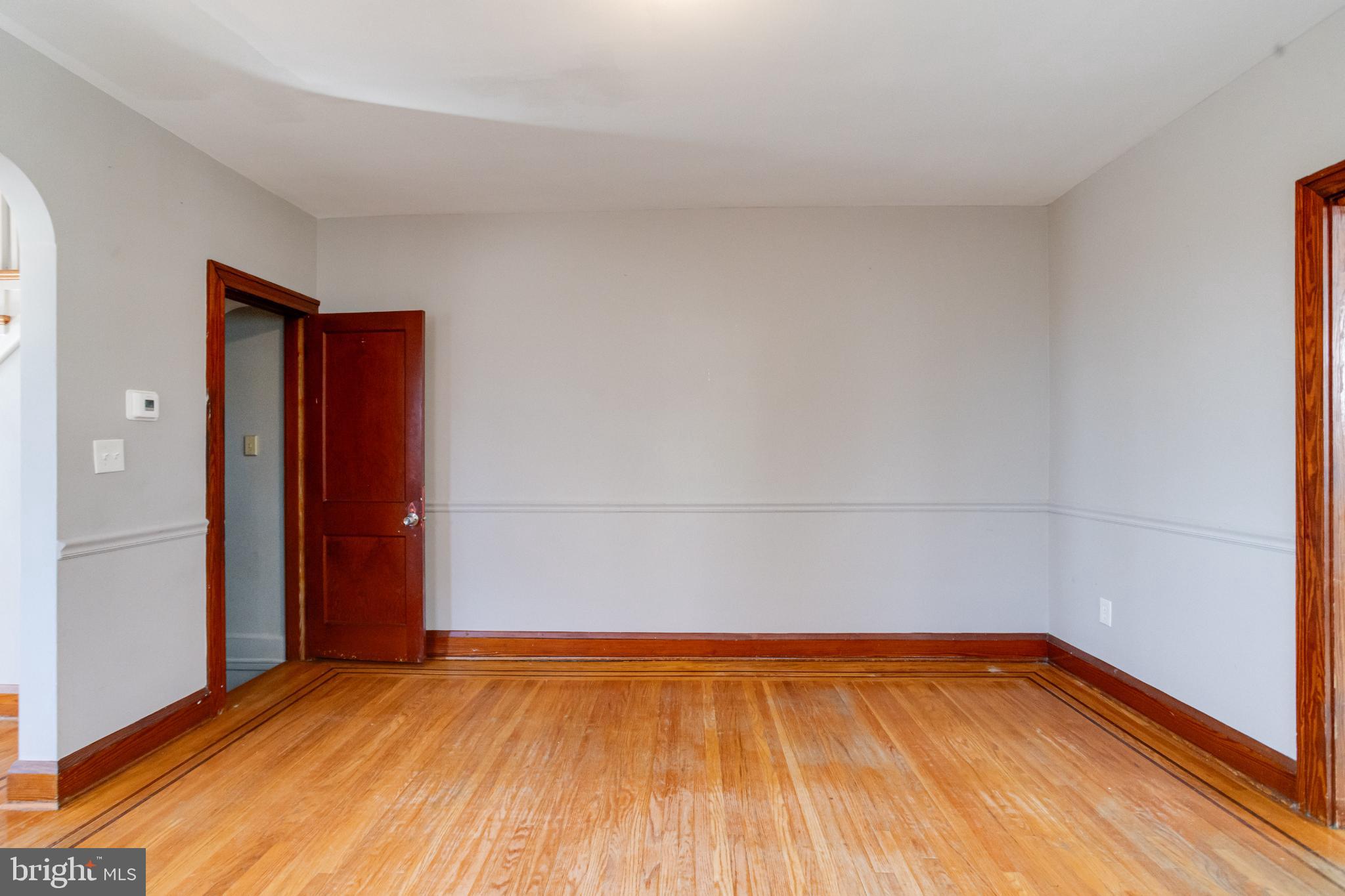 4114 Moravia Road Baltimore, MD 21206 - Photo 17 of 50 Spacious room with classic wood accents.