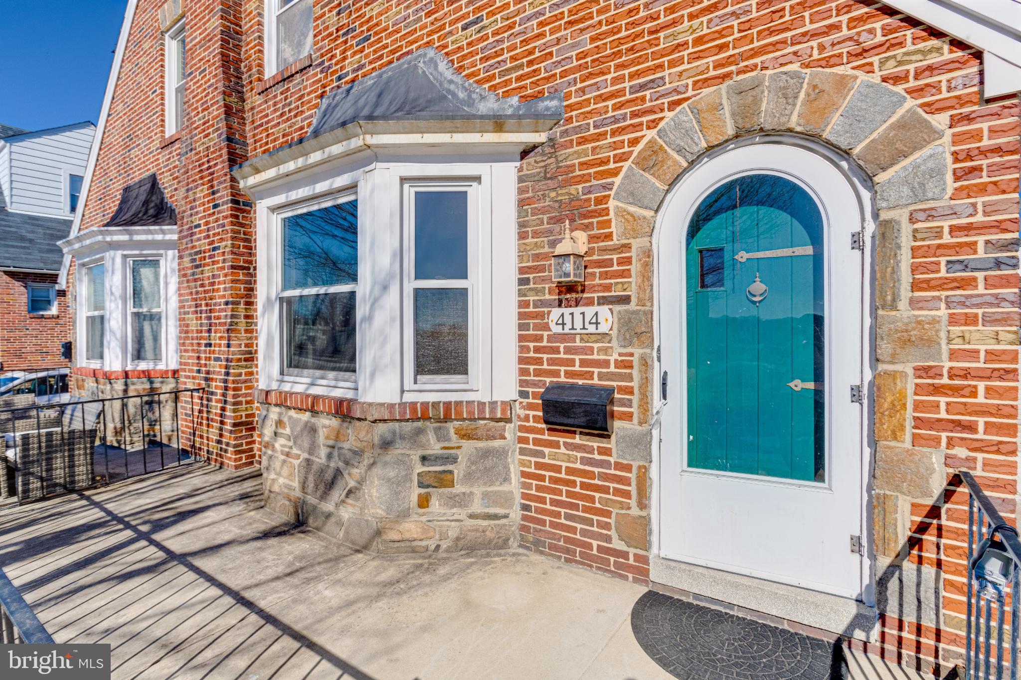 4114 Moravia Road Baltimore, MD 21206 - Photo 4 of 50 Charming brick facade with vibrant entryway.