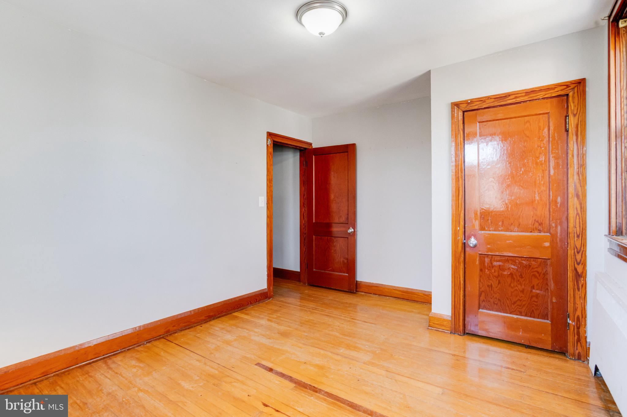 4114 Moravia Road Baltimore, MD 21206 - Photo 46 of 50 Spacious room with classic wooden accents.