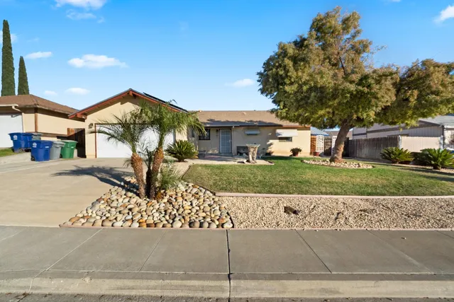 front view of a house with a street