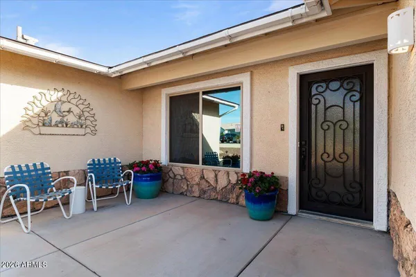 a view of a chairs in front of house