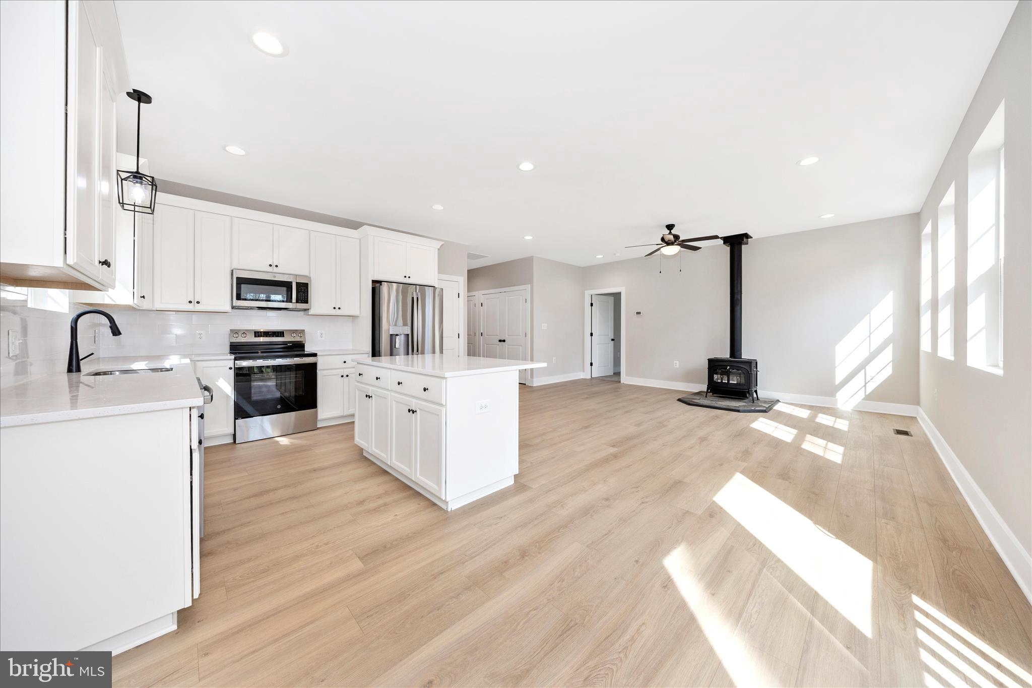 4 Fir Trail Fairfield, PA 17320 - Photo 12 of 53 a large kitchen with kitchen island a sink a center island stainless steel appliances and a window