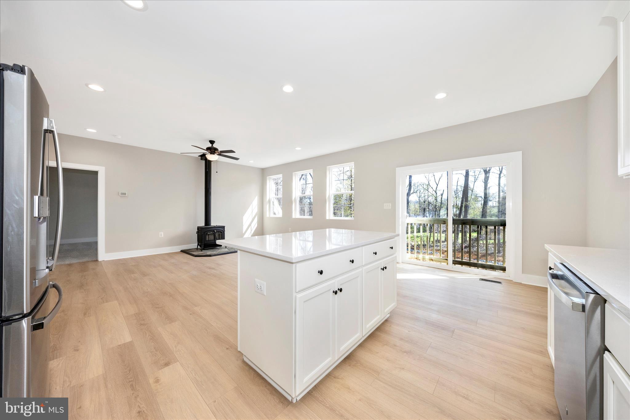 4 Fir Trail Fairfield, PA 17320 - Photo 14 of 53 a large white room with a large window and wooden floor