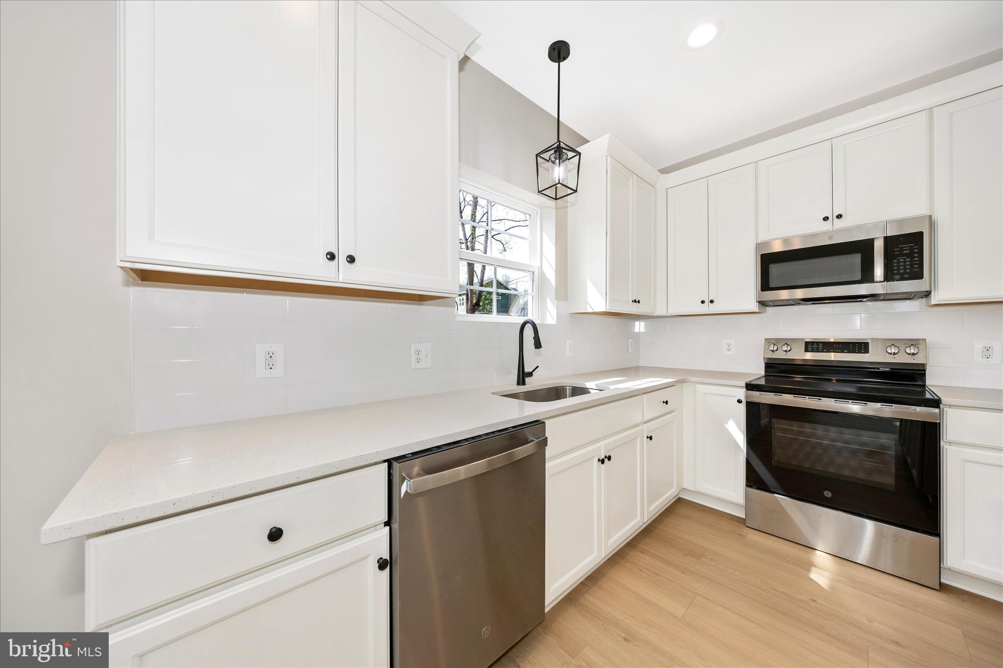 4 Fir Trail Fairfield, PA 17320 - Photo 17 of 53 a kitchen with stainless steel appliances white cabinets and a sink