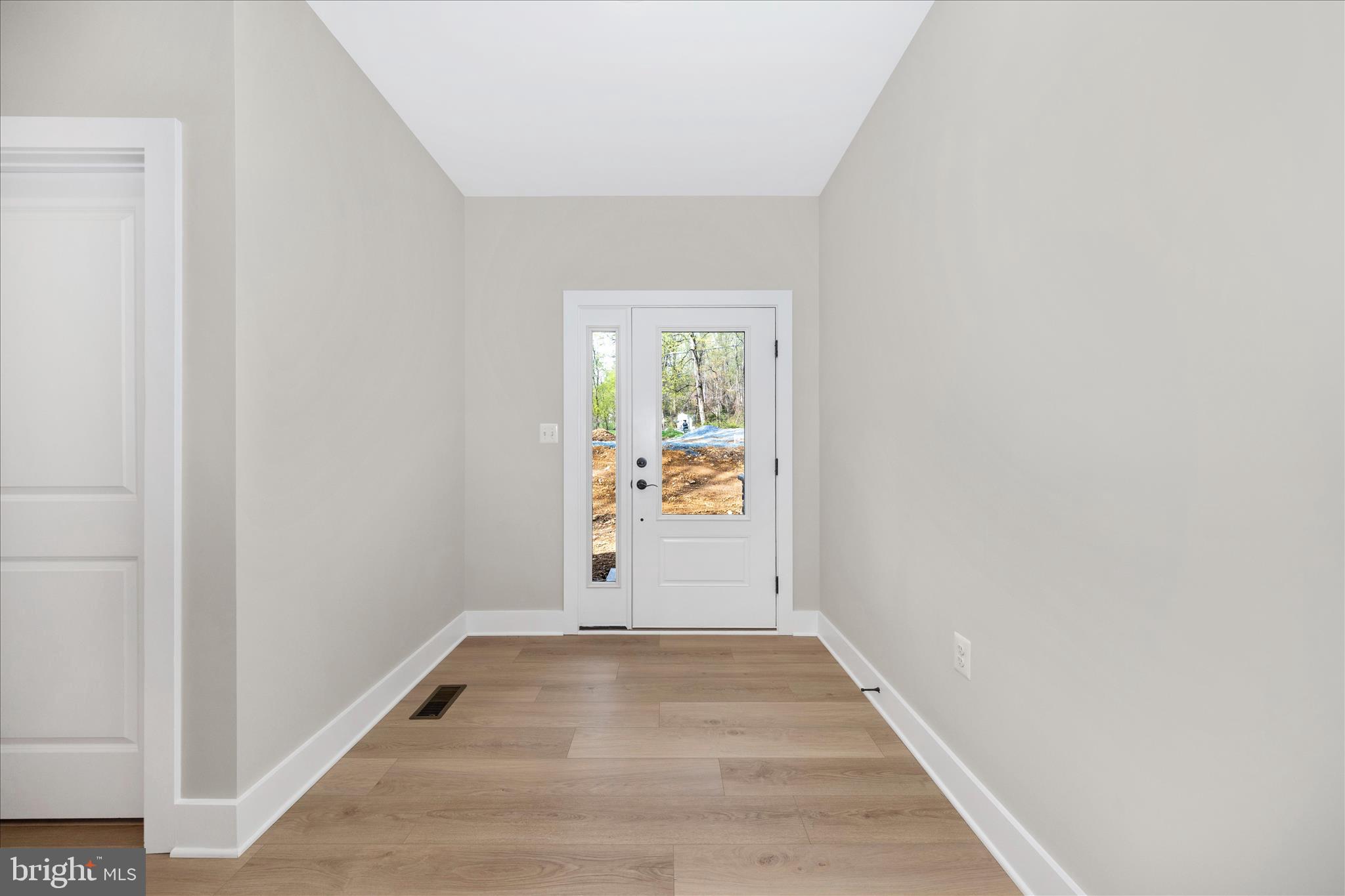 4 Fir Trail Fairfield, PA 17320 - Photo 2 of 53 a view of an empty room with wooden floor