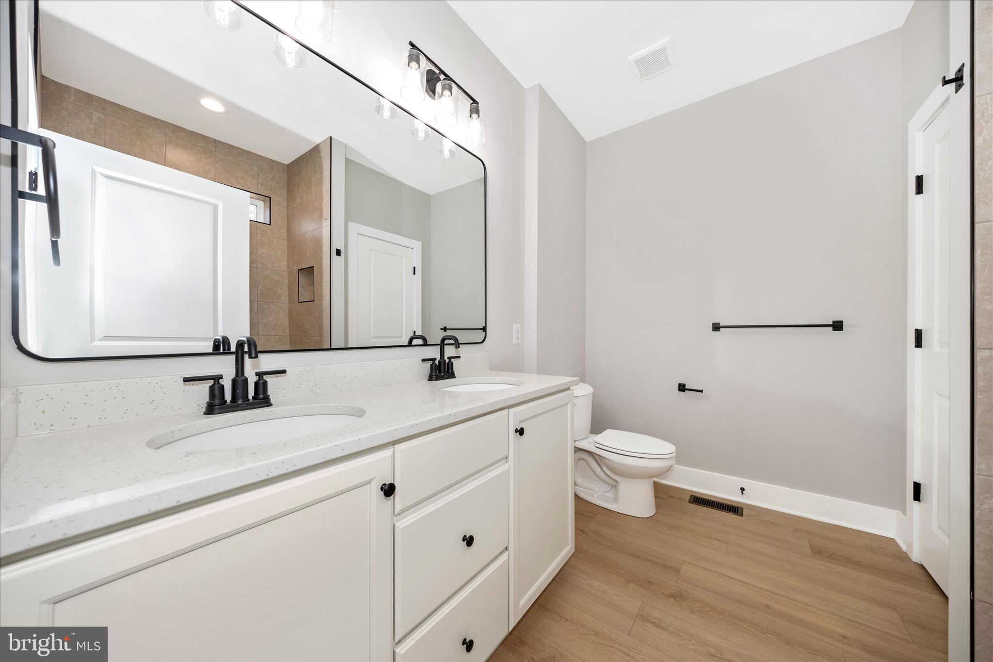 4 Fir Trail Fairfield, PA 17320 - Photo 22 of 53 a bathroom with a double vanity sink and a mirror