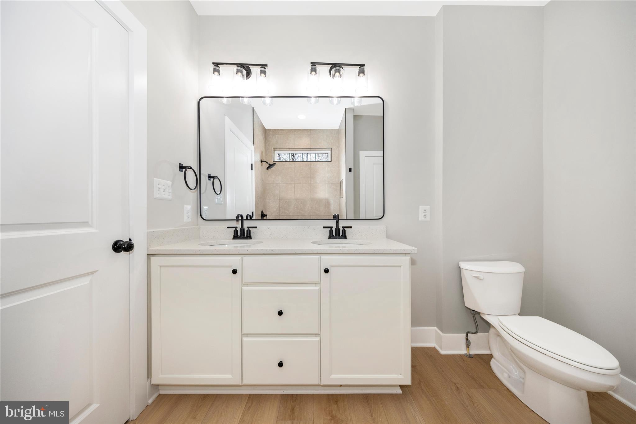 4 Fir Trail Fairfield, PA 17320 - Photo 23 of 53 a bathroom with a toilet a sink and mirror