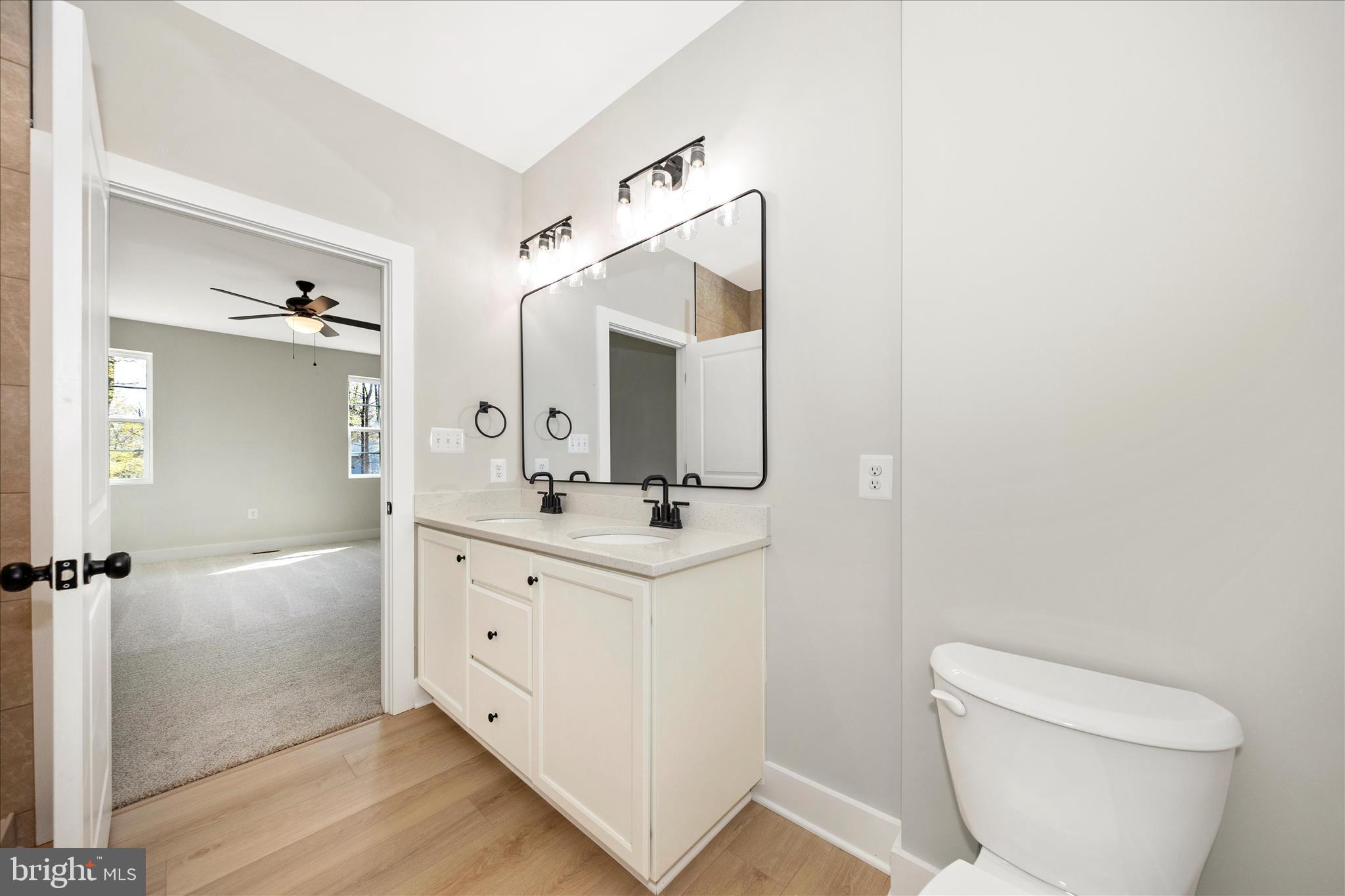 4 Fir Trail Fairfield, PA 17320 - Photo 25 of 53 a bathroom with a double vanity sink mirror and toilet