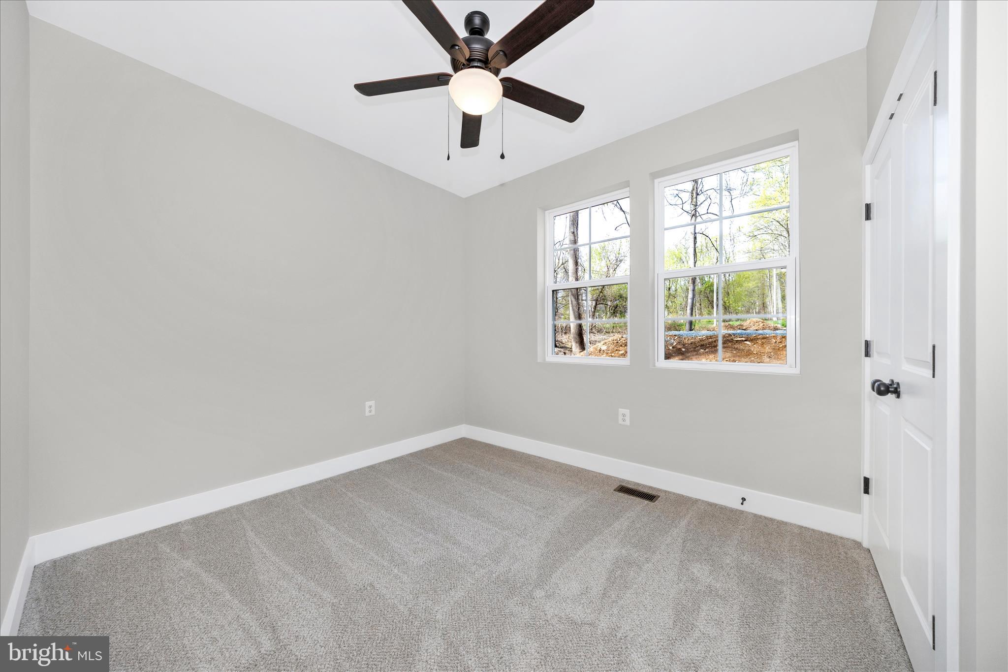 4 Fir Trail Fairfield, PA 17320 - Photo 26 of 53 an empty room with ceiling fan and windows