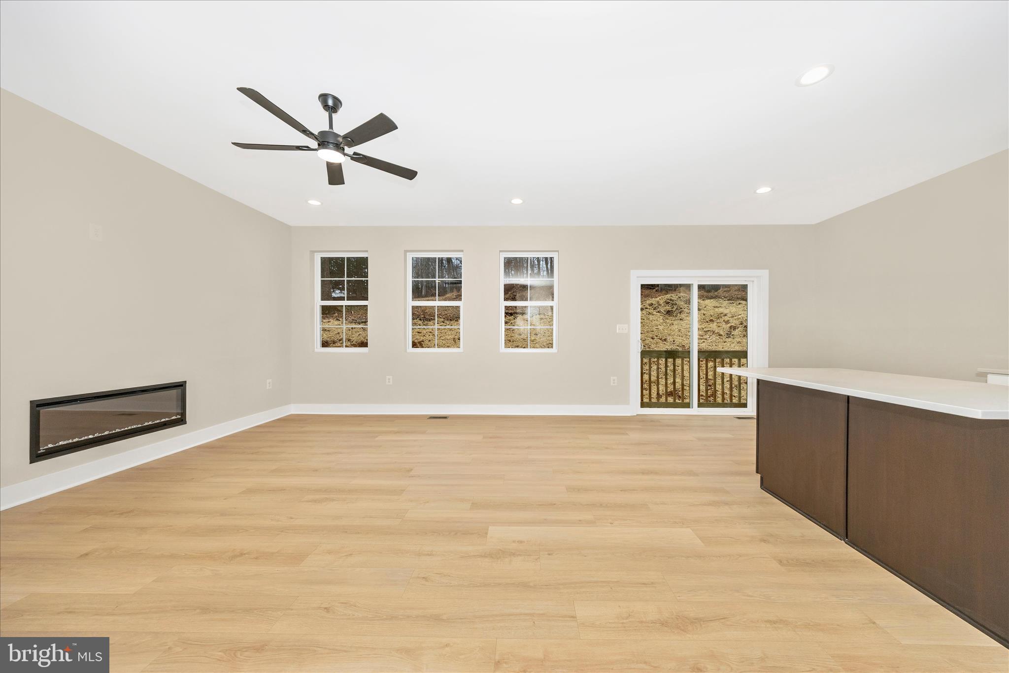 4 Fir Trail Fairfield, PA 17320 - Photo 28 of 53 a view of an empty room with a window and wooden floor