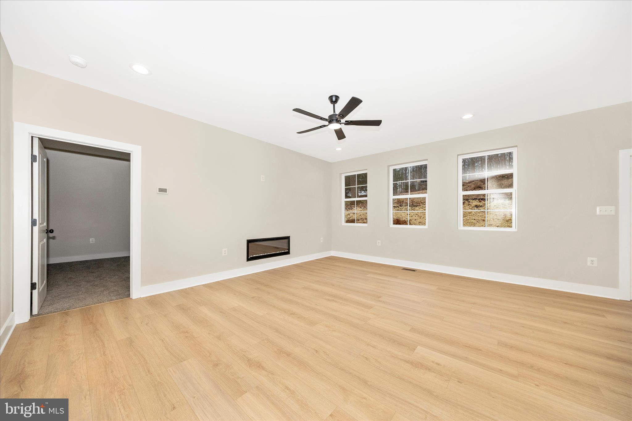 4 Fir Trail Fairfield, PA 17320 - Photo 29 of 53 a view of an empty room with a window and a kitchen