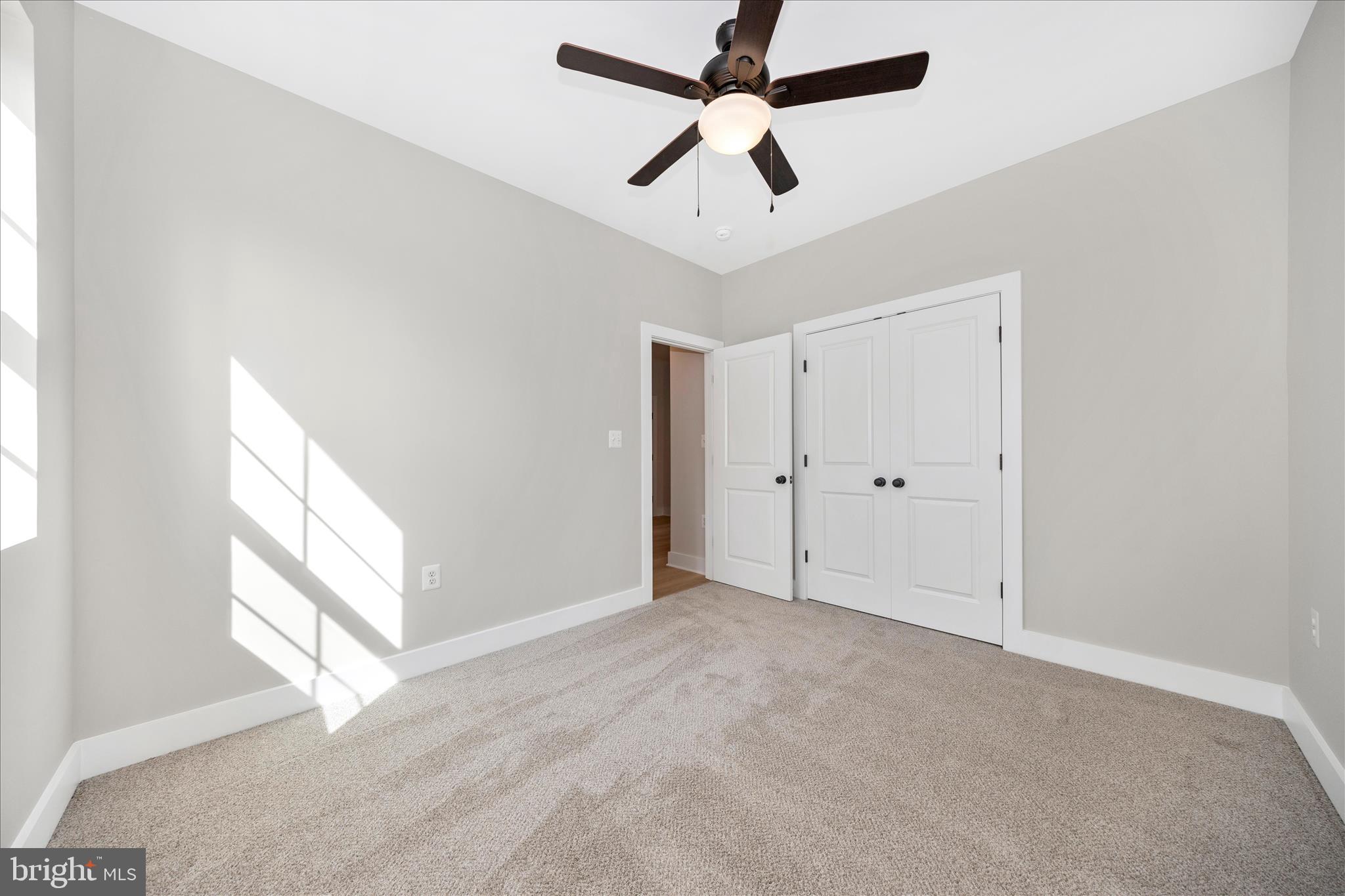 4 Fir Trail Fairfield, PA 17320 - Photo 30 of 53 an empty room with windows and fan