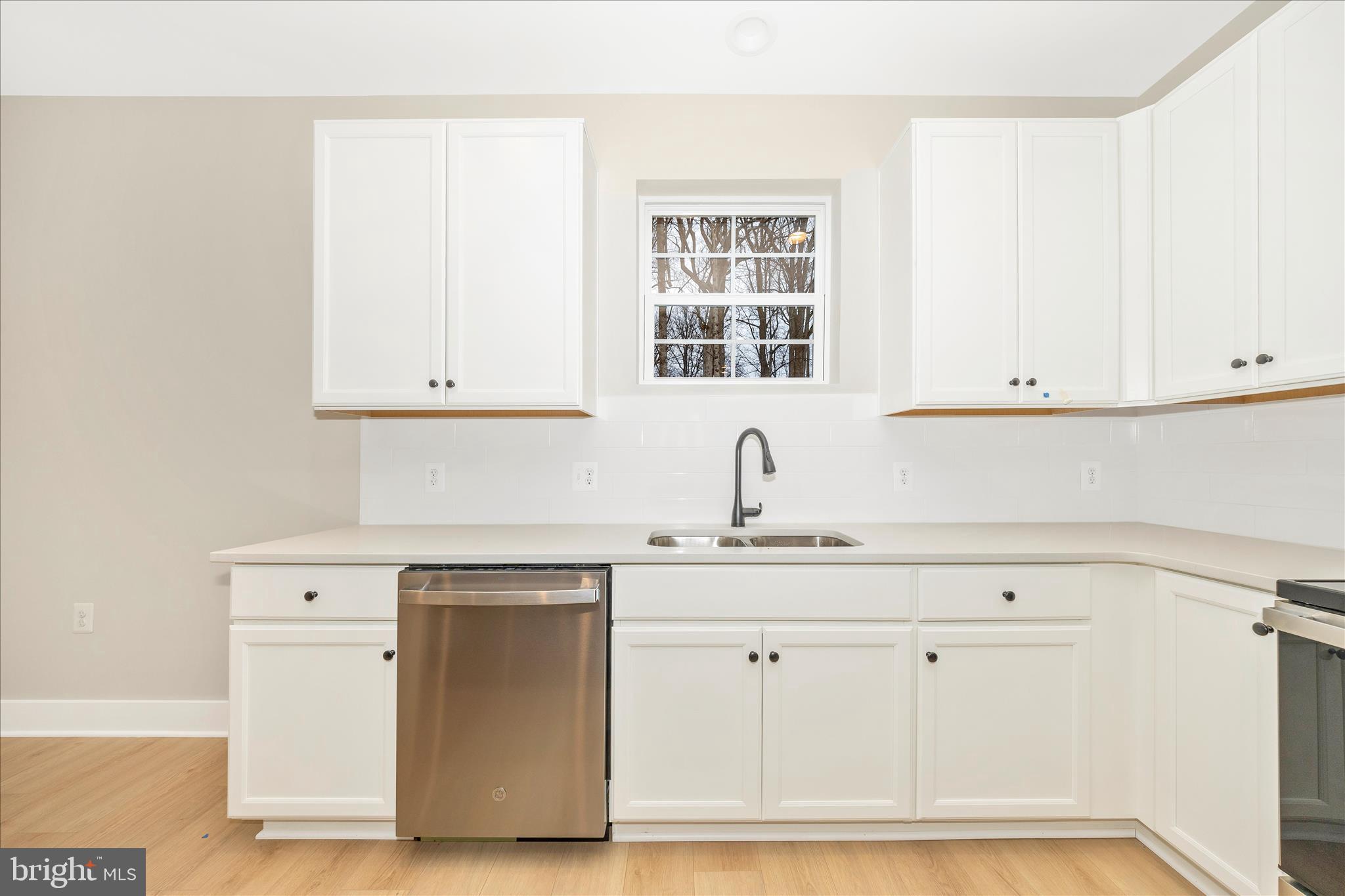 4 Fir Trail Fairfield, PA 17320 - Photo 34 of 53 a kitchen with white cabinets and sink