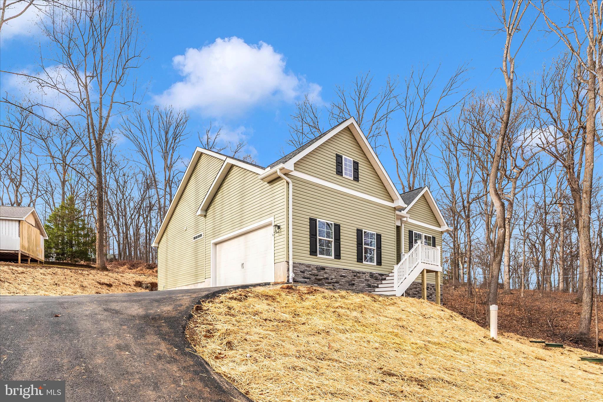 4 Fir Trail Fairfield, PA 17320 - Photo 50 of 53 a view of a white house with a yard covered in snow