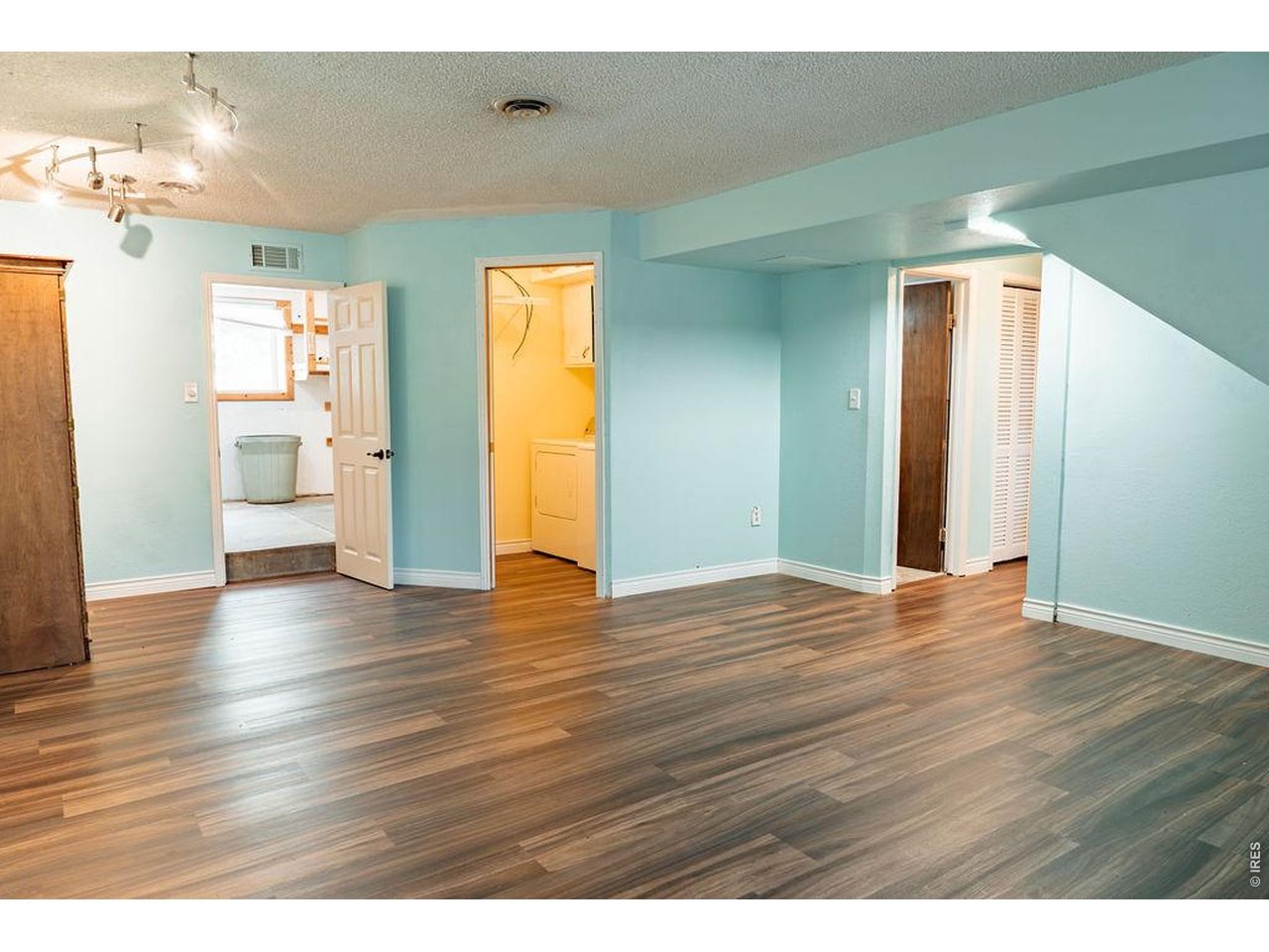522 South Bryan Avenue Fort Collins, CO 80521 - Photo 25 of 43 Lower-Level Family Room