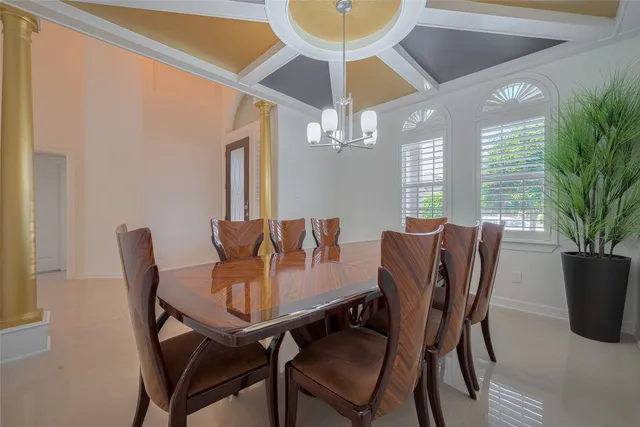 a bedroom with a bed and a lamp