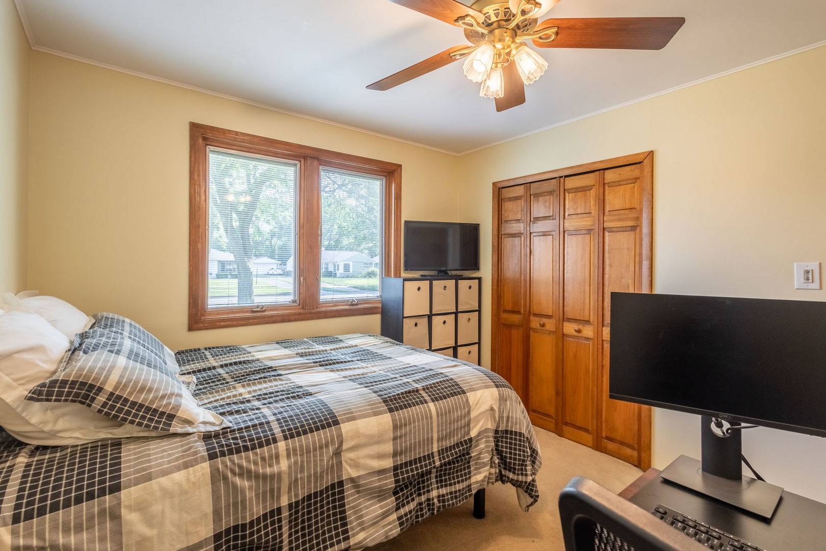 2802 Campbell Street Rolling Meadows, IL 60008 - Photo 13 of 27 a bedroom with a bed and a flat screen tv