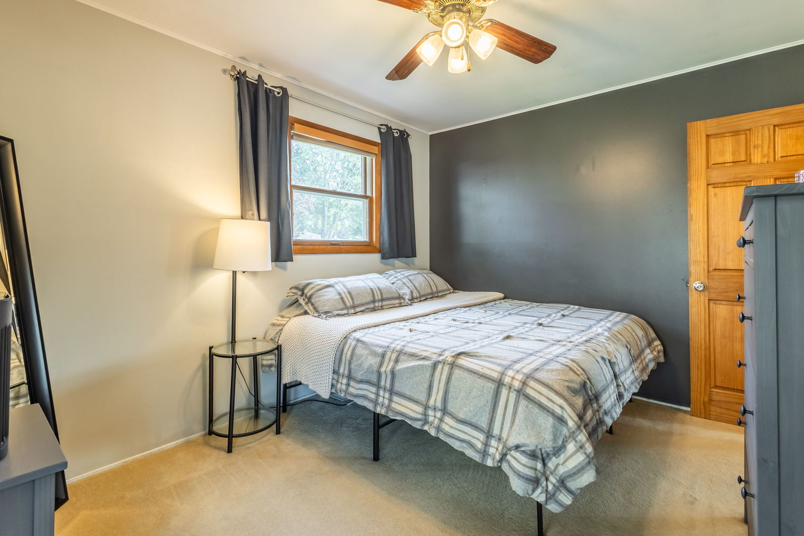 2802 Campbell Street Rolling Meadows, IL 60008 - Photo 17 of 27 a bedroom with a bed and a chandelier