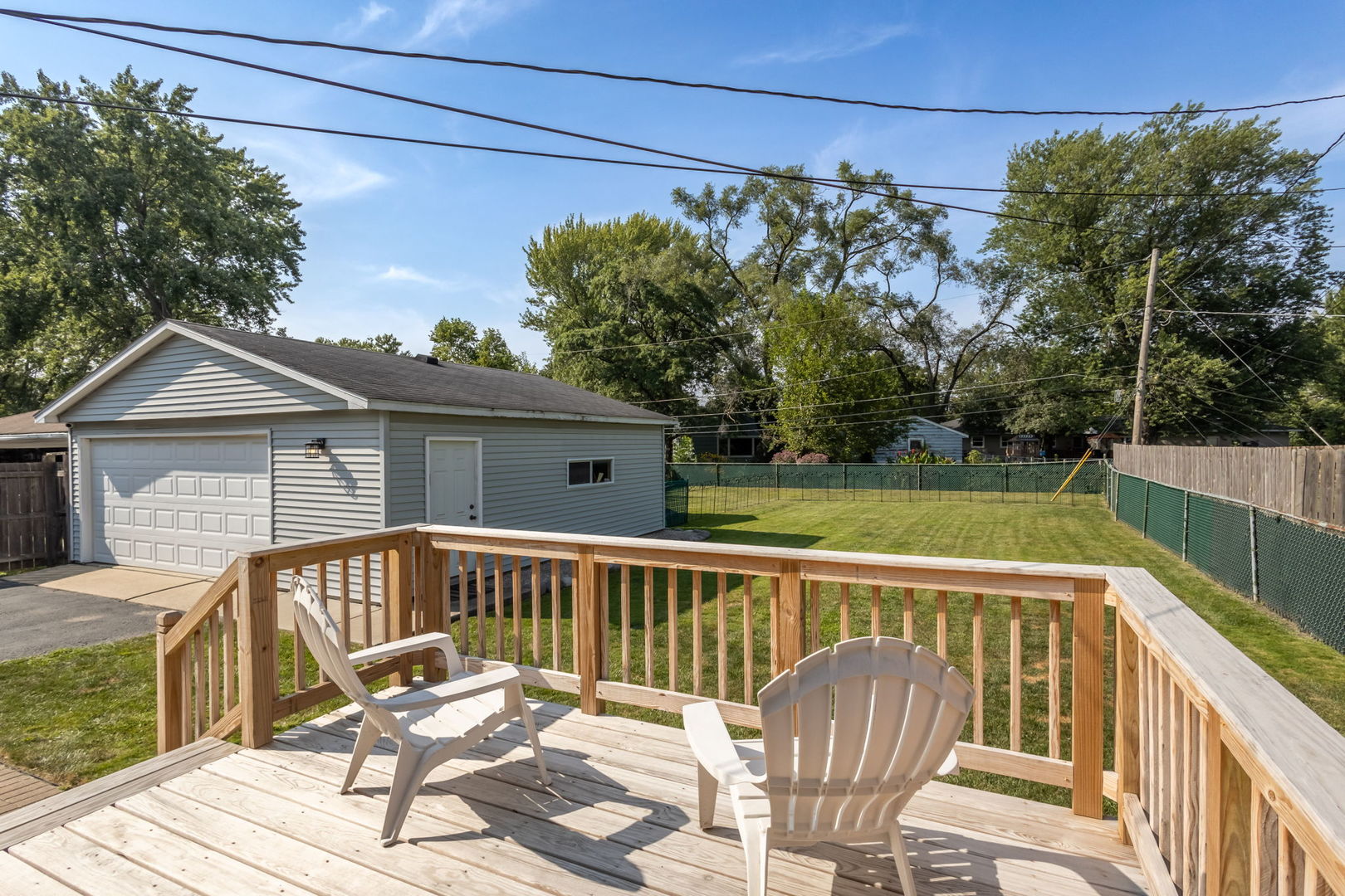 2802 Campbell Street Rolling Meadows, IL 60008 - Photo 23 of 27 a view of a chair and table on the wooden floor