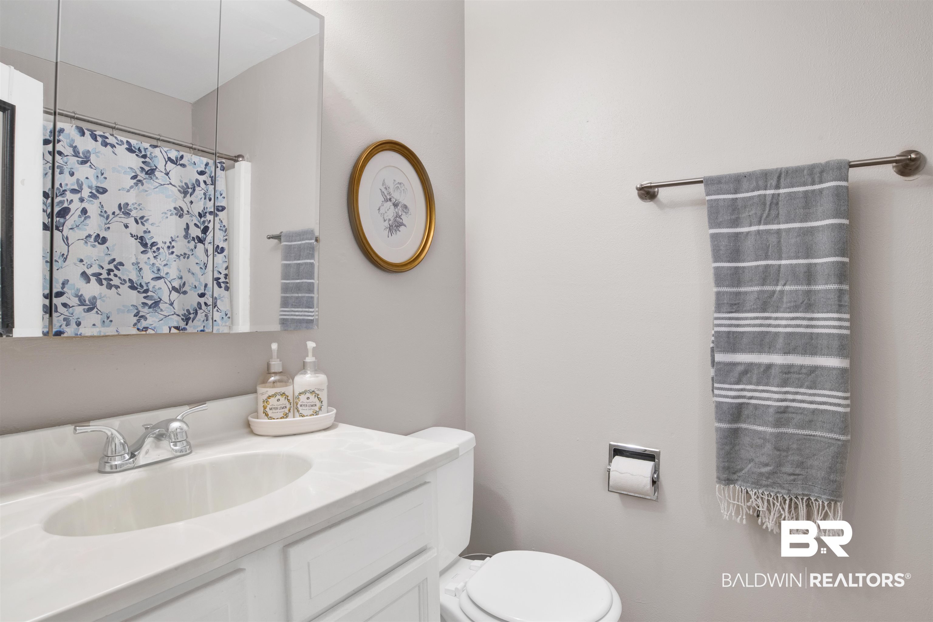 160 Emogene Place Mobile, AL 36606 - Photo 19 of 32 Bathroom featuring vanity and a shower with curtain