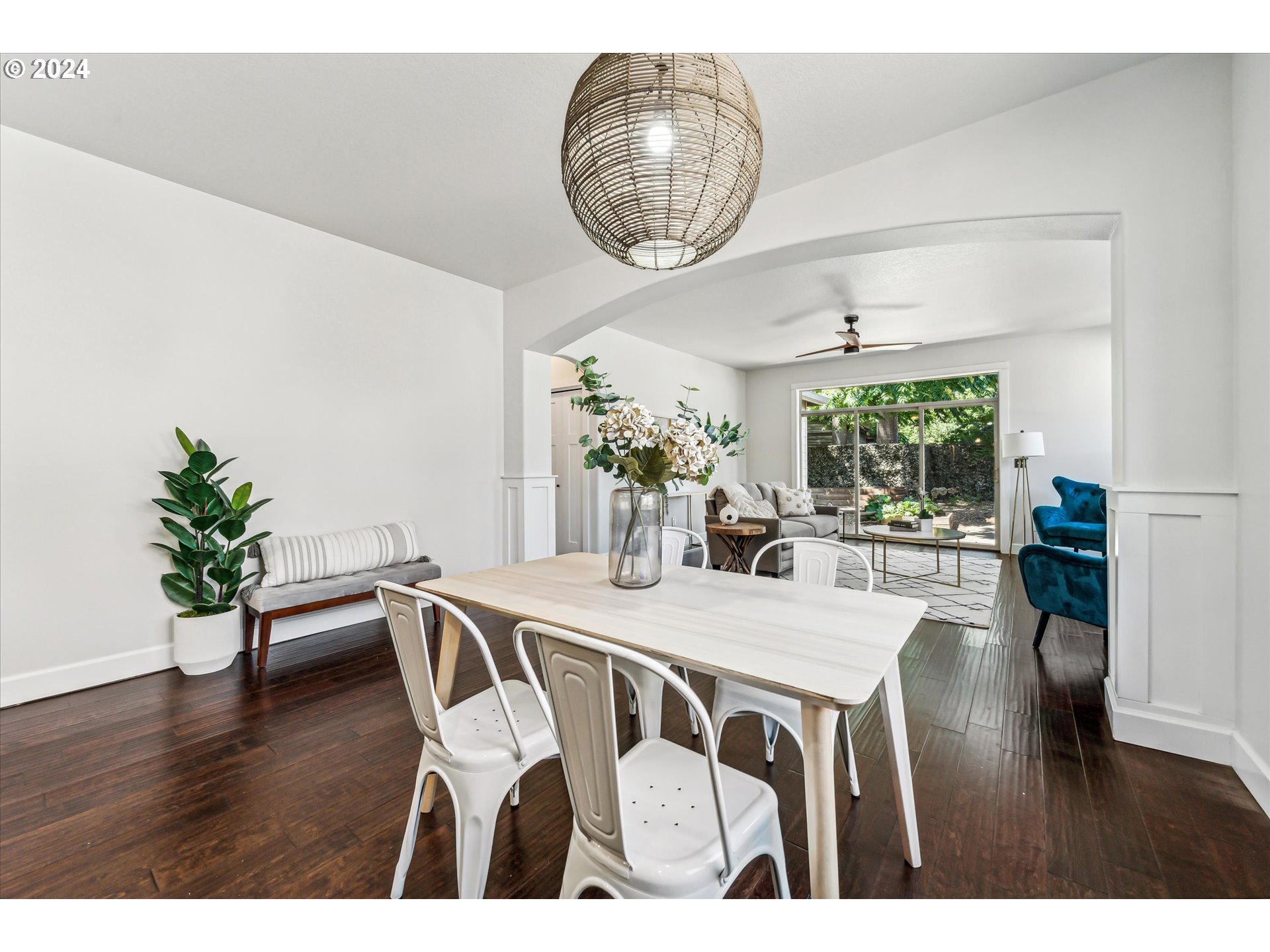 5731 Southeast Nehalem Street Portland, OR 97206 - Photo 7 of 21 a view of a dining room with furniture and wooden floor