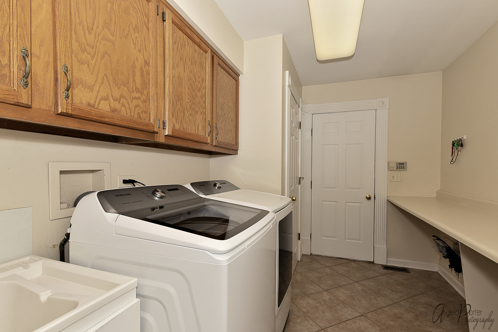 5230 Hilltop Road Long Grove, IL 60047 - Photo 14 of 45 a utility room with dryer and washer