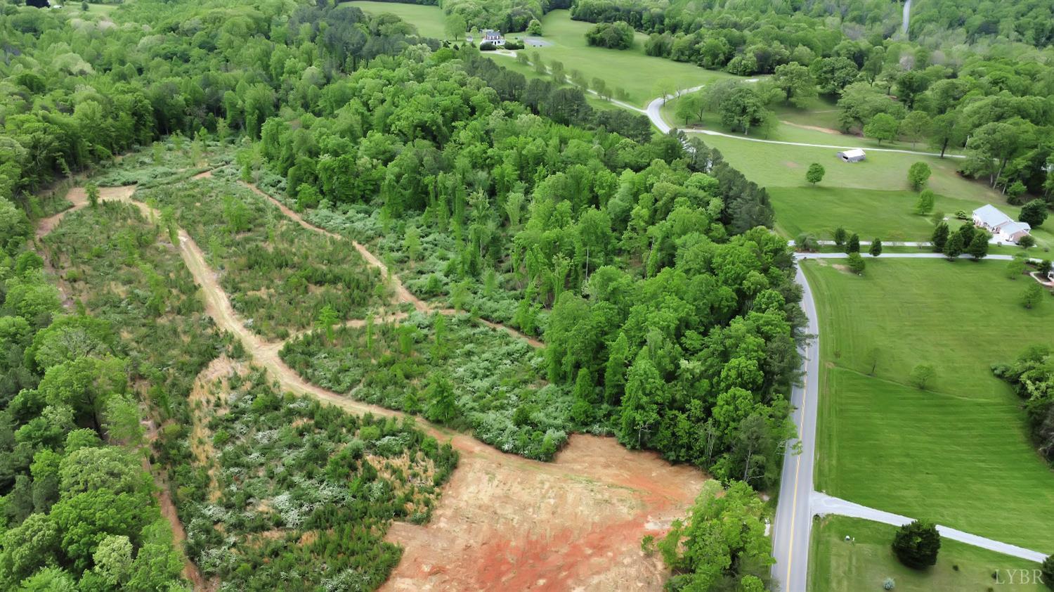0 Skinnell Mill Road Bedford, VA 24523 - Photo 9 of 18 an aerial view of residential houses with outdoor space and trees