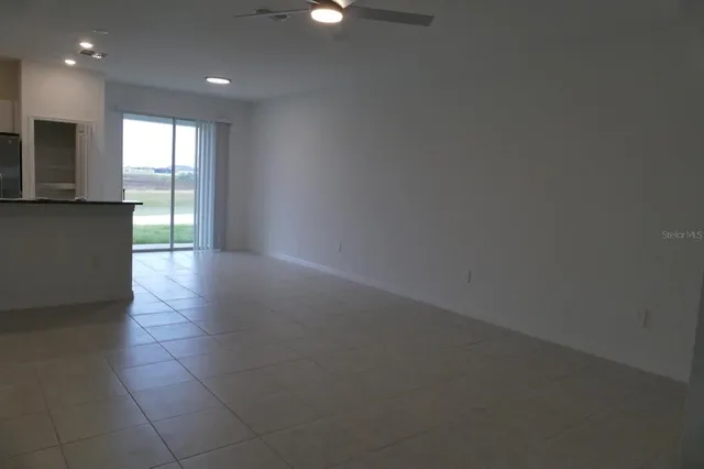 a view of hallway with a window