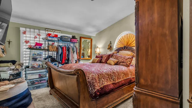 a bed room with a bed and a window