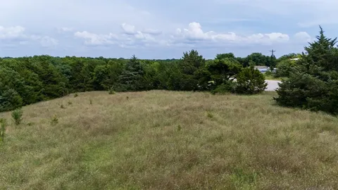a view of outdoor space and trees