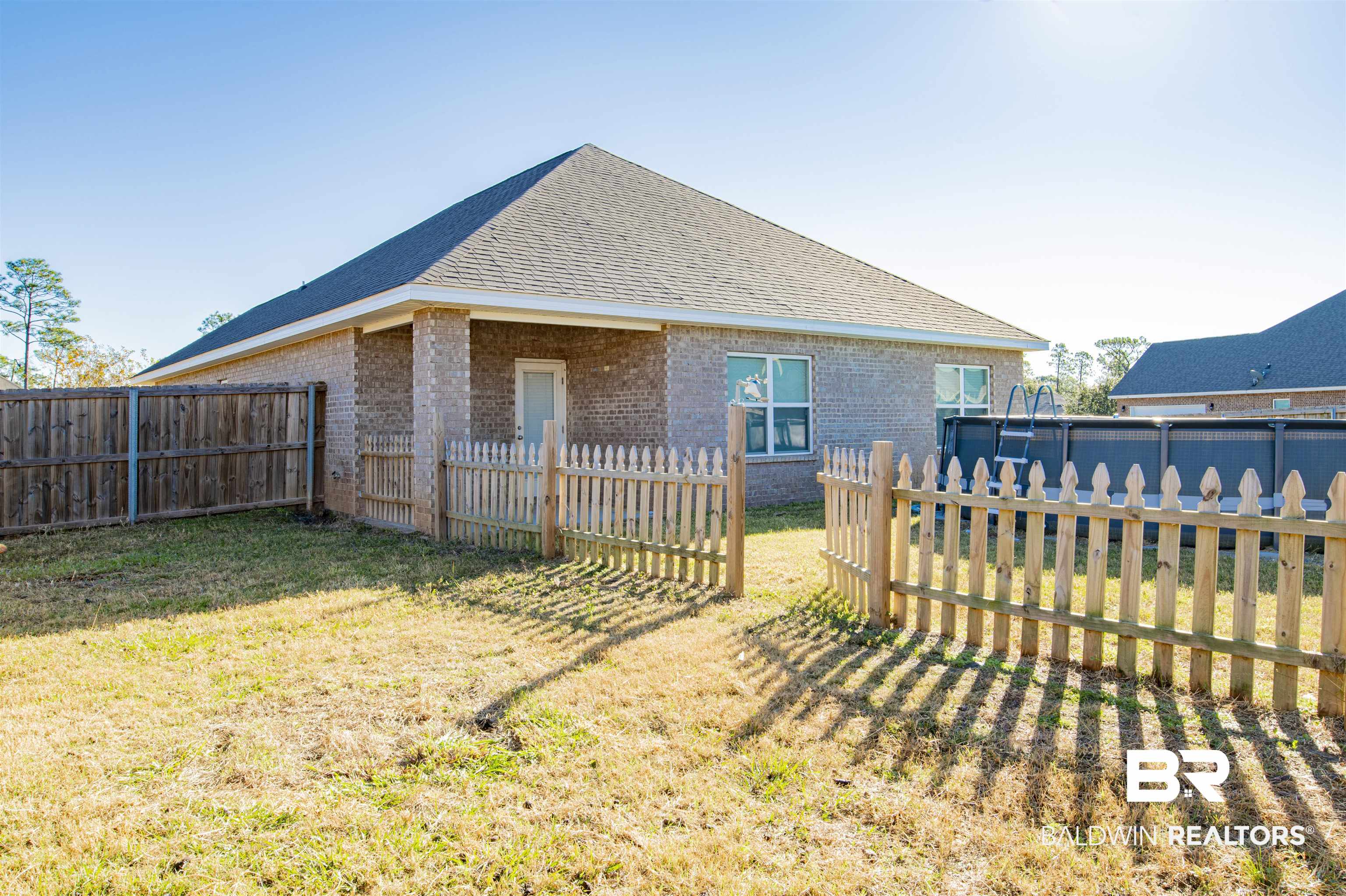 13111 Kinlock Falls Avenue Fairhope, AL 36532 - Photo 24 of 34 Fenced off area used as vegetable garden