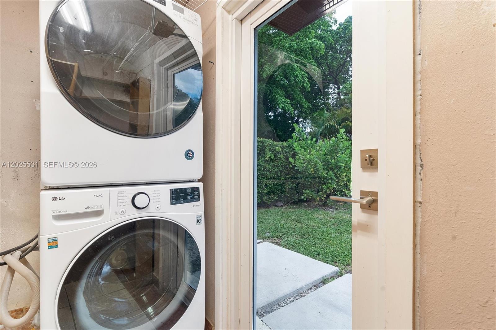 3951 Southwest 2nd Terrace, Unit 3951 Miami, FL 33134 - Photo 21 of 21 a utility room with dryer and washer