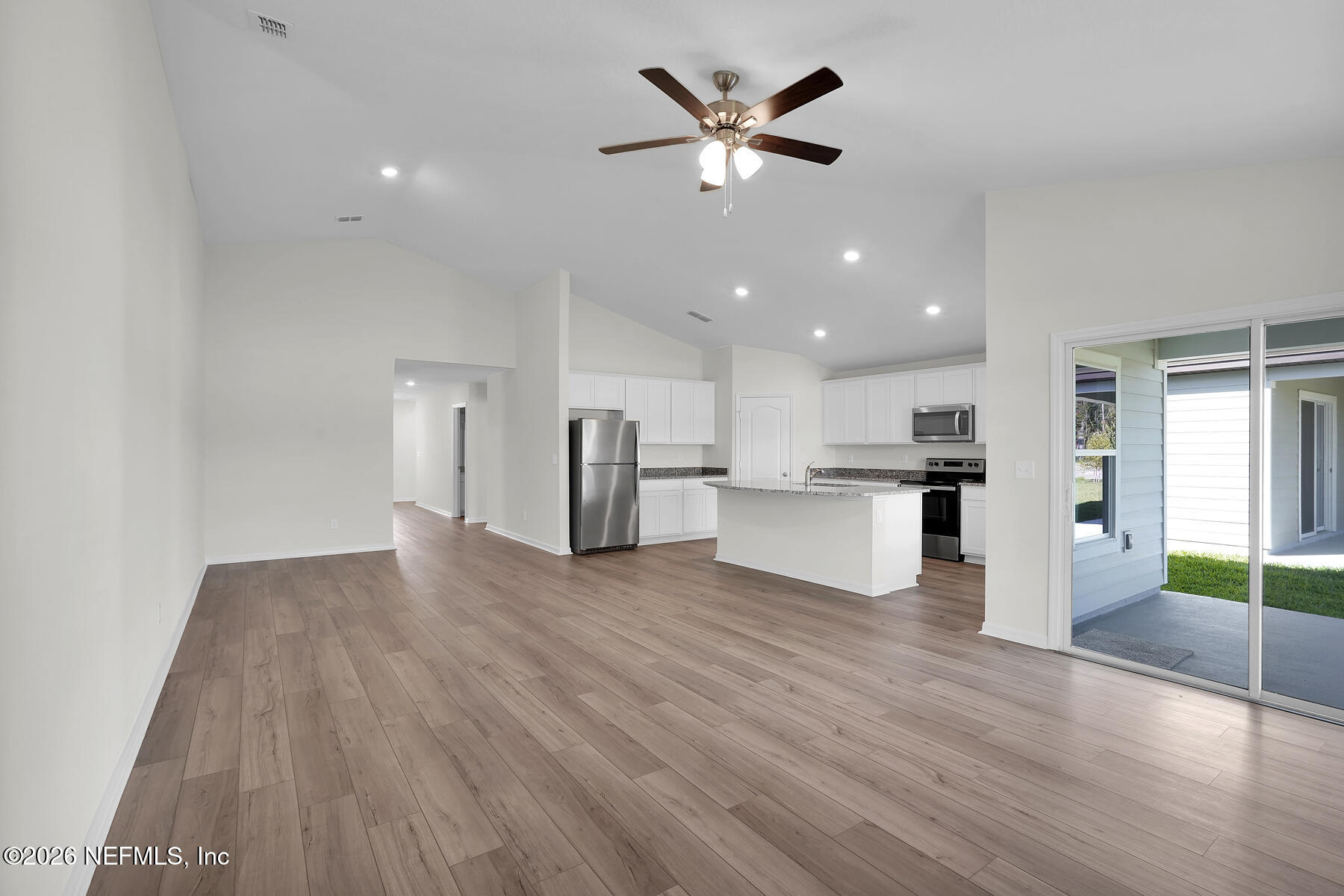 6949 Canoe Birch Road Jacksonville, FL 32219 - Photo 11 of 22 a view of kitchen with cabinets and stainless steel appliances