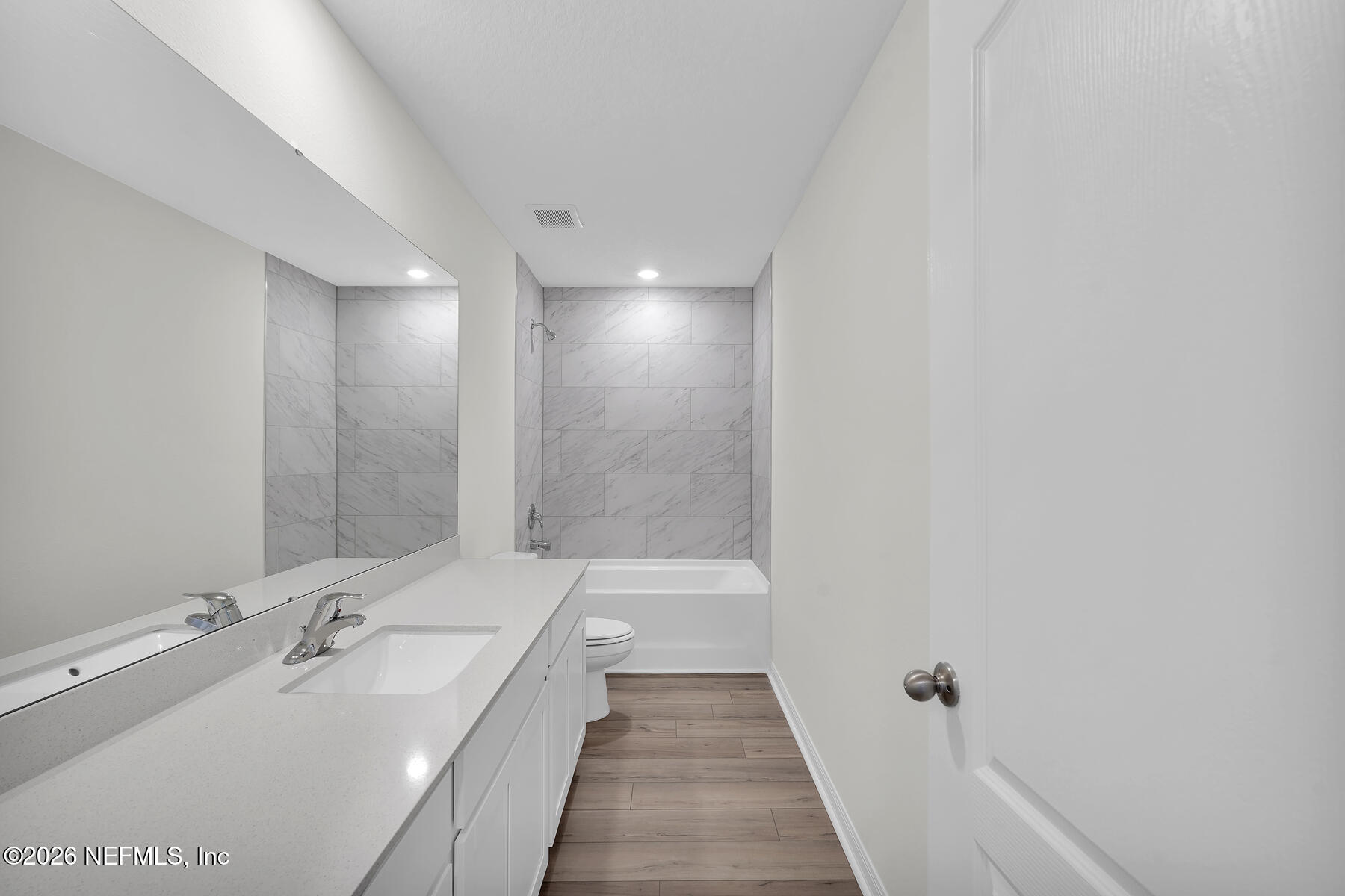 6949 Canoe Birch Road Jacksonville, FL 32219 - Photo 17 of 22 a bathroom with a bathtub and shower