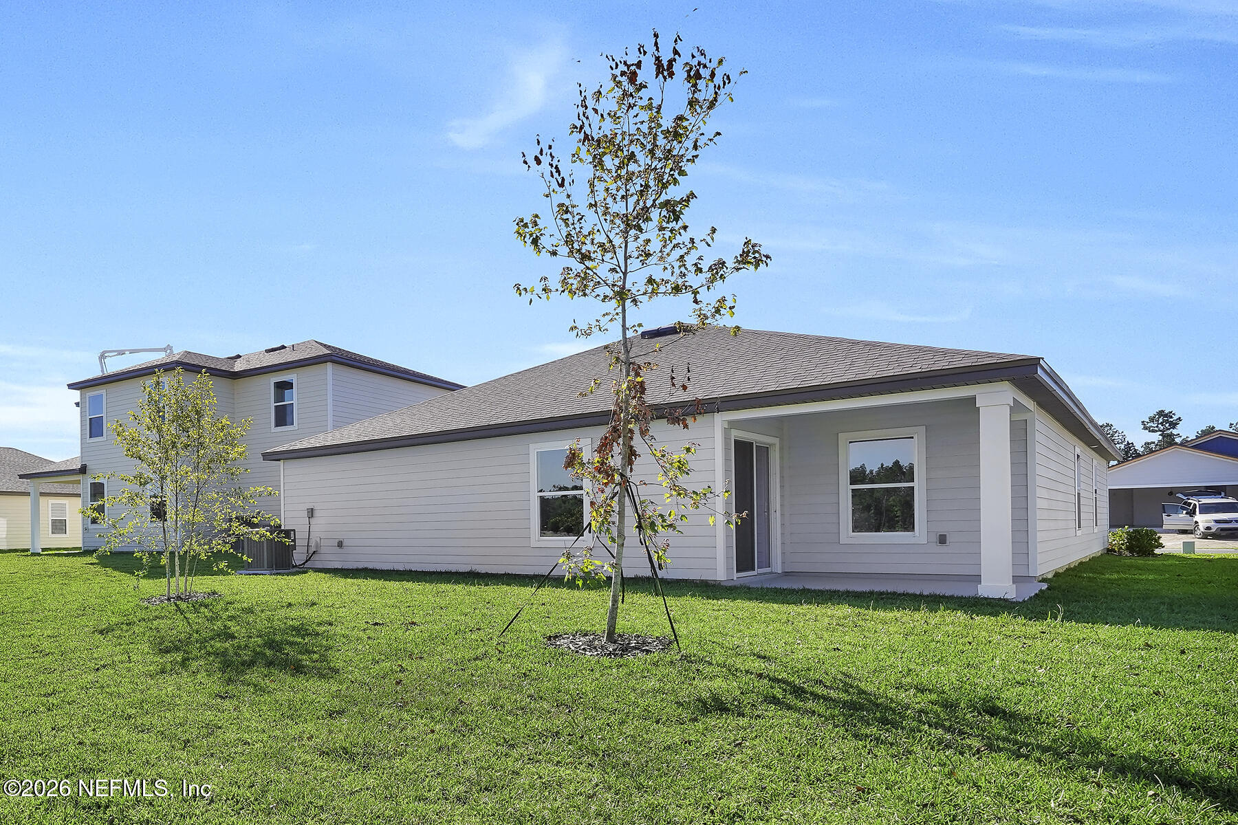 6949 Canoe Birch Road Jacksonville, FL 32219 - Photo 22 of 22 a house view with a garden space