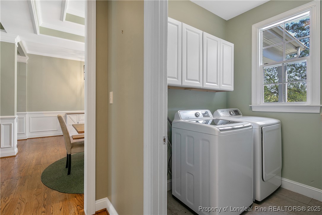 533 Falling Water Road Spring Lake, NC 28390 - Photo 23 of 50 a utility room with closet dryer and washer