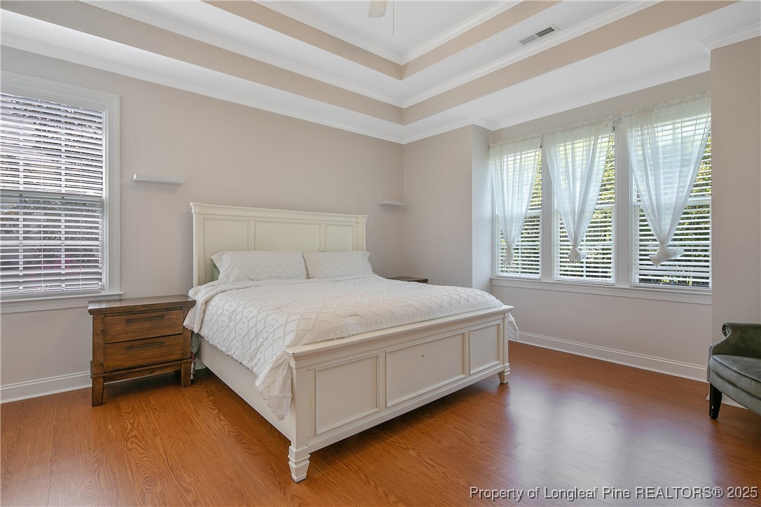 533 Falling Water Road Spring Lake, NC 28390 - Photo 25 of 50 a bed sitting in a bedroom next to a window