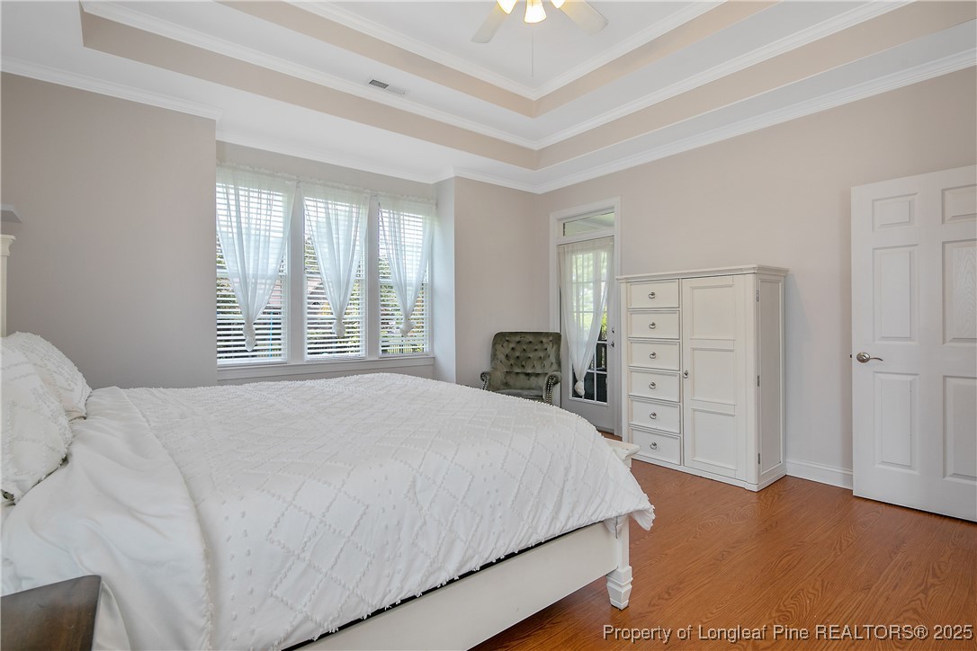 533 Falling Water Road Spring Lake, NC 28390 - Photo 26 of 50 a bedroom with a bed and a dresser