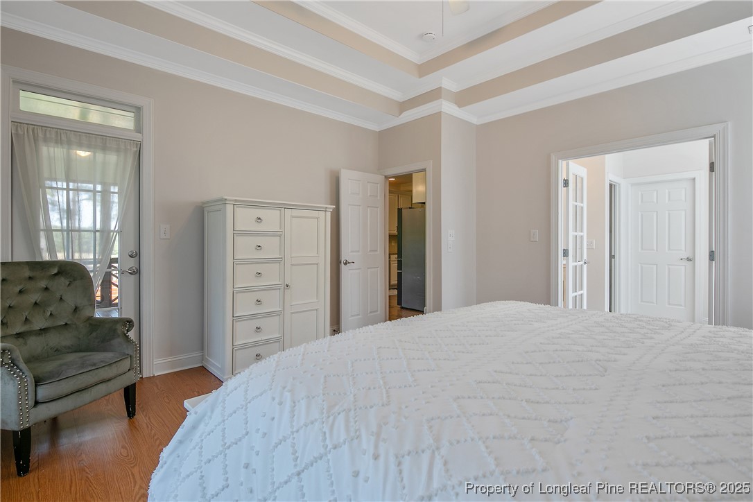 533 Falling Water Road Spring Lake, NC 28390 - Photo 27 of 50 a bedroom with a bed and a couch