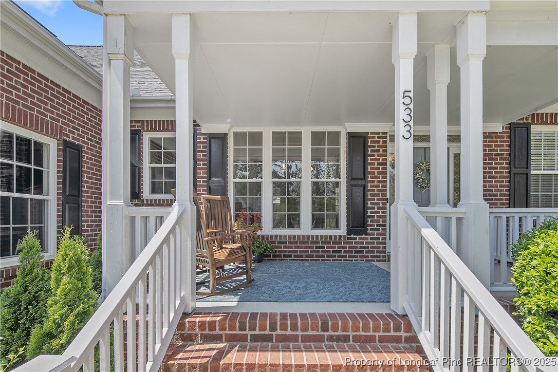 533 Falling Water Road Spring Lake, NC 28390 - Photo 4 of 50 a view of a house with porch and wooden floor