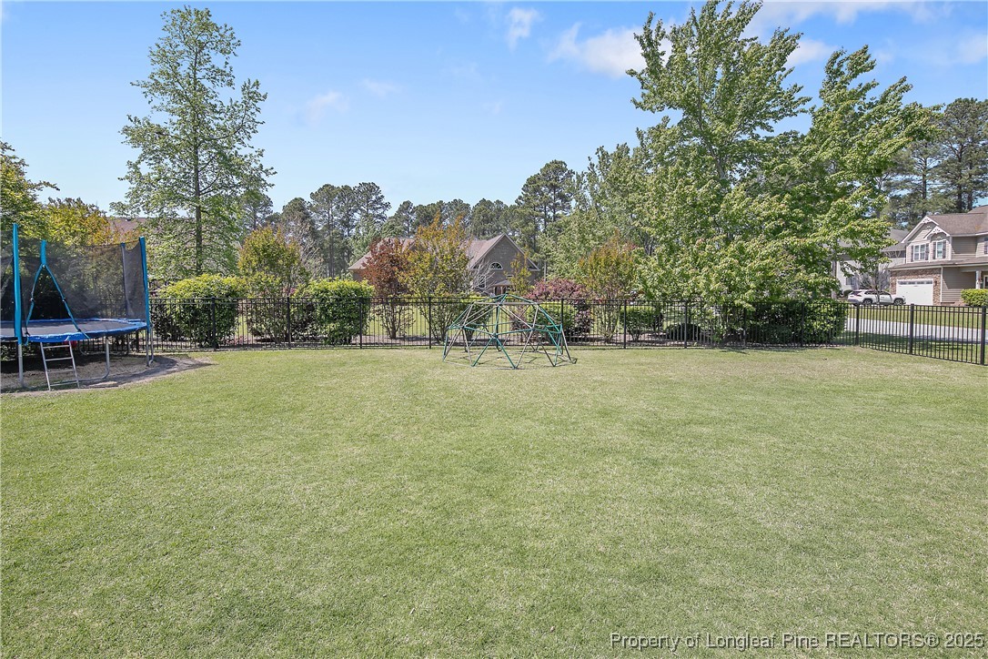 533 Falling Water Road Spring Lake, NC 28390 - Photo 50 of 50 a view of outdoor space with deck and yard