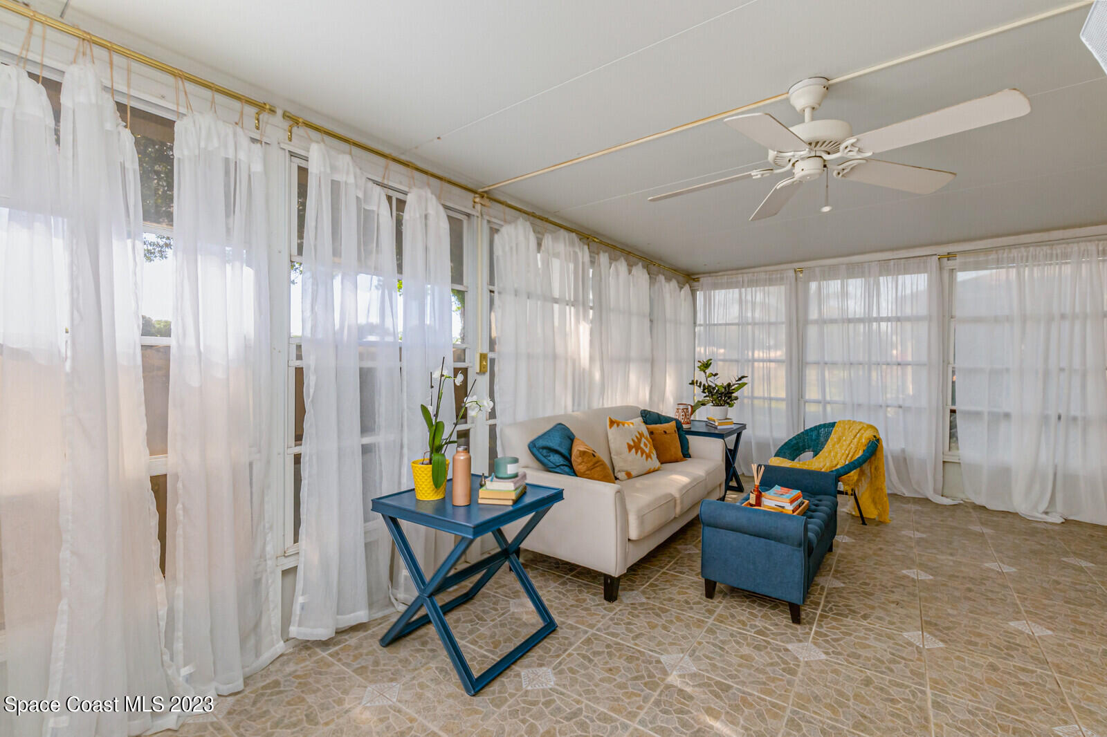 2154 Spring Creek Circle Palm Bay, FL 32905 - Photo 8 of 35 a bedroom with furniture and a window