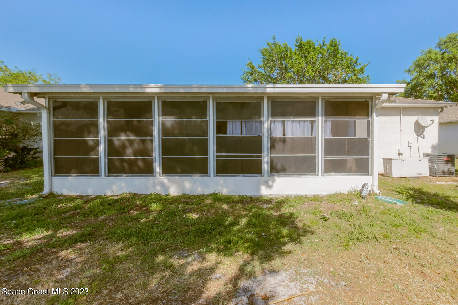 2154 Spring Creek Circle Palm Bay, FL 32905 - Photo 10 of 35 a view of front door