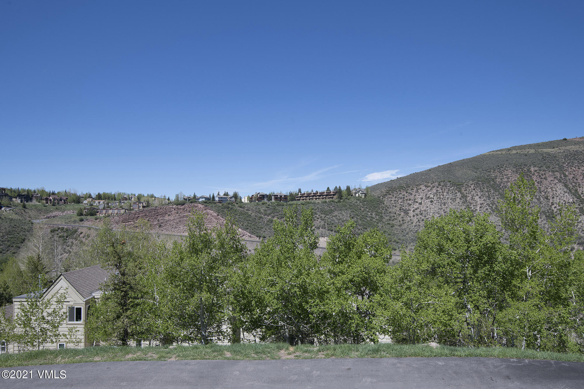 1066 West Wildwood Road, Unit D Avon, CO 81620 - Photo 12 of 21 a view of a lake with a mountain in the background