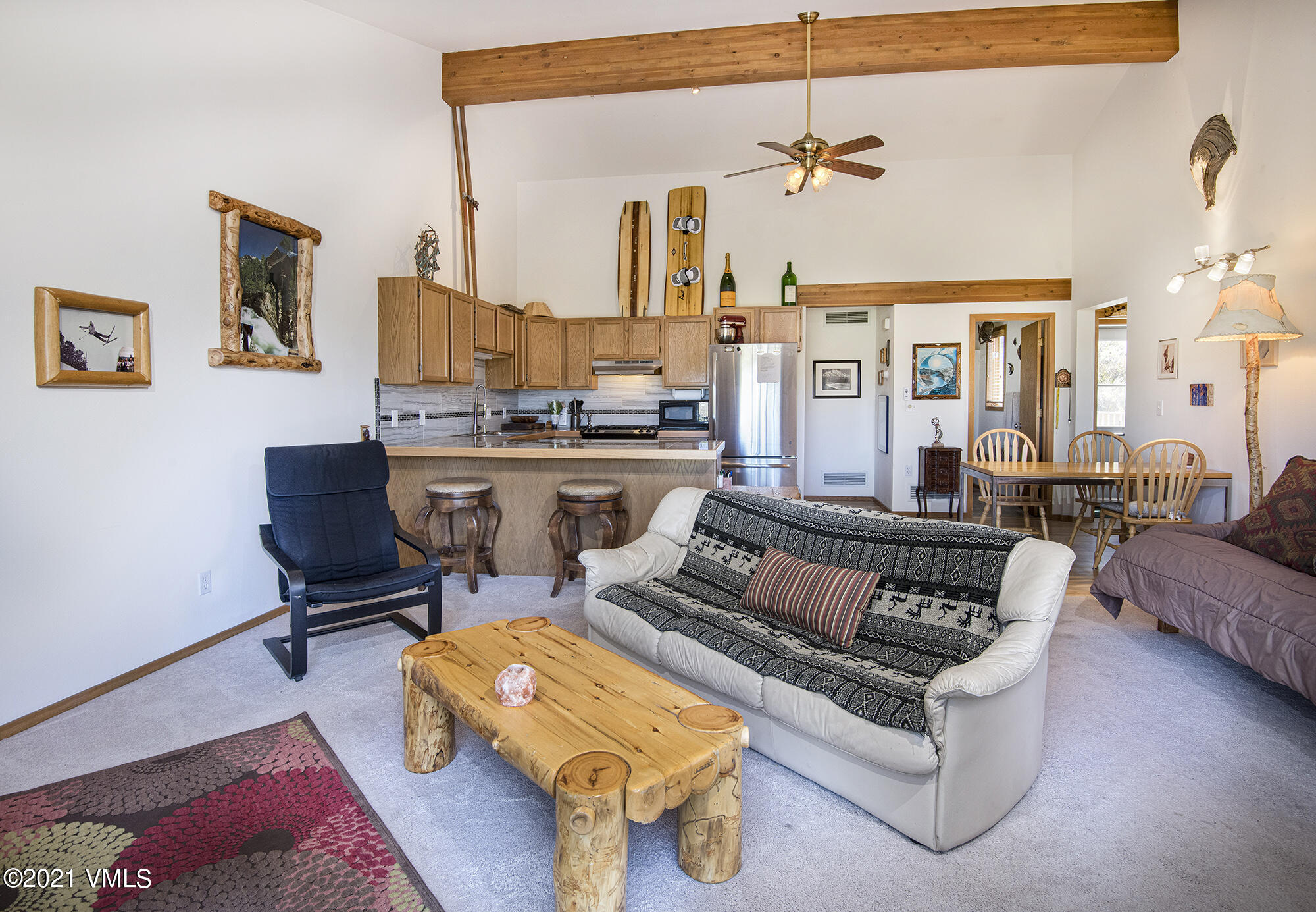 1066 West Wildwood Road, Unit D Avon, CO 81620 - Photo 8 of 21 a living room with furniture and a rug